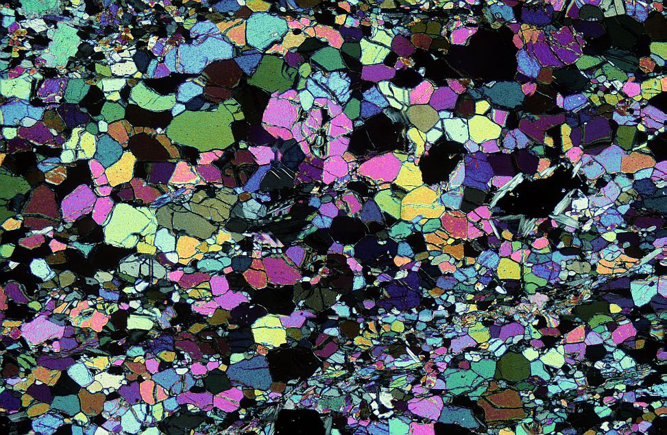 Thin section of dunite in crossed polars