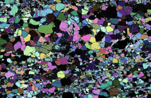 Thin section of dunite in crossed polars