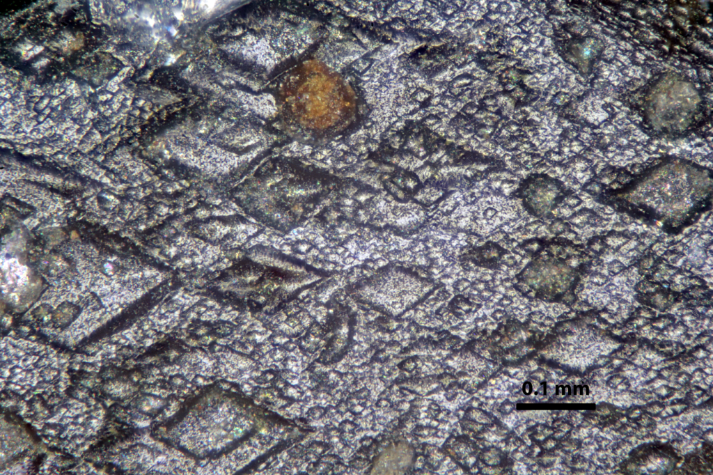 Surface texture of a garnet crystal from Emerald Creek, Idaho