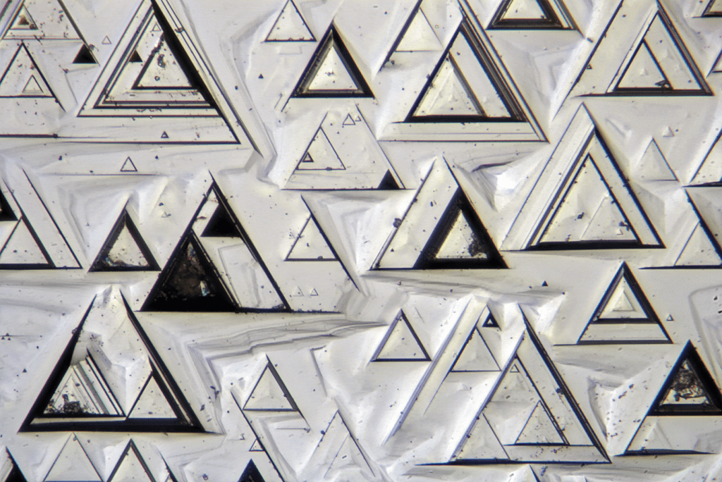 Trigons on a diamond crystal from Udachnoe kimberlite pipe, Sakha, Russia